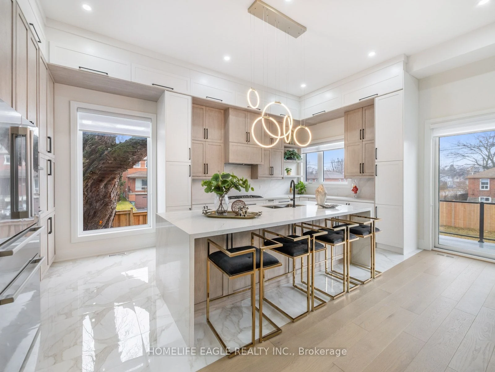 Bright renovated kitchen with island seating